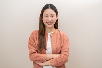 Smile positive, happy asian young woman, girl in casual, portrait of beautiful female with long hair feeling prond, standing crossed arms looking at camera, isolated on white background, copy space.