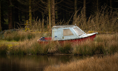 old boat on the lake