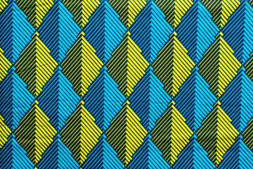 top view of blue ankara fabric, flatlay of nigerian wax cloth with designs, spread out blue ankara...