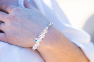 Bracelet on a brides wrist from a recent wedding