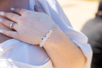 Bracelet on a brides wrist from a recent wedding