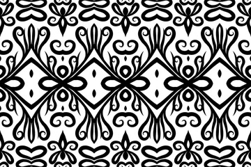 Seamless batik ethnic dayak ornament pattern of indonesian culture traditional art