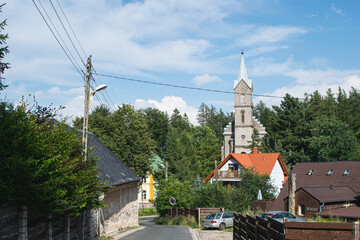 View of the beautiful church in the summer forest. church in the village. 