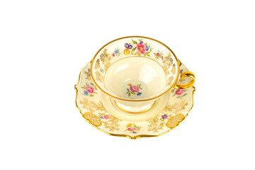 Vintage porcelain cups and saucer isolated on white.