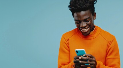 Man Smiling at Smartphone Screen