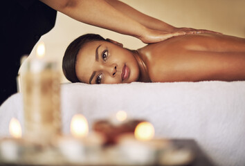 Back massage, relax and thinking with woman in spa for health, skincare or stress relief on bed....