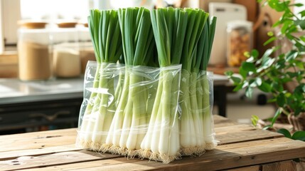 Leek in transparant package, kitchen background setting