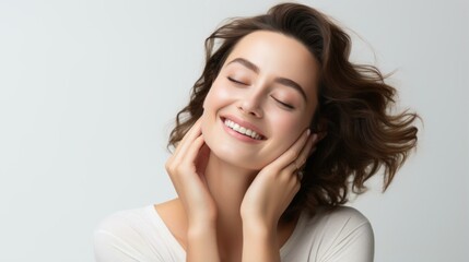 b'Portrait of a beautiful young woman with brown hair and white skin smiling with her eyes closed'