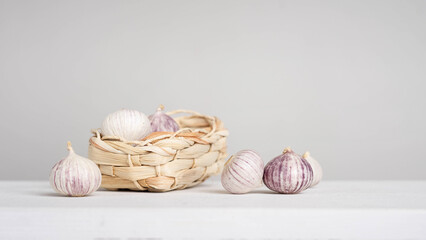 Farm garlic in a wicker basket.