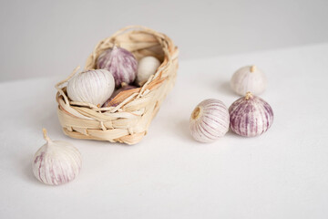 Farm garlic in a wicker basket.