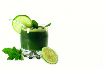 glass of green juice of mix vegetable and fruit with lemon slice and mint leaves,cutout in 
white background,copy space