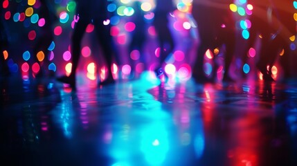 Blurred bursts of colorful spotlights shining down on a dimly lit dance floor the silhouetted figures of people moving to the rhythm ly visible in the background. . - obrazy, fototapety, plakaty