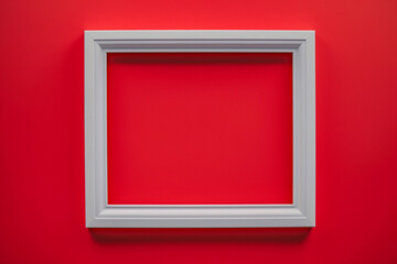 red frame, Elevate your flatlay design with a touch of elegance and sophistication, as a white horizontal art frame takes center stage against a bold red background