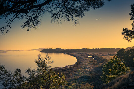 sunset from the &ldquo;Bellevue&rdquo; viewpoint. In the distance the town of Agde and Mont Saint Loup