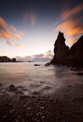Sunset between the rocks at low tide on the shore of Playa del Silencio, Asturias III