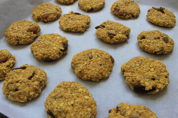 homemade cookies made from oatmeal, raisins, seeds