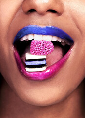 Eating, lipstick and black woman with candy for sweets, luxury and biting isolated on pink...