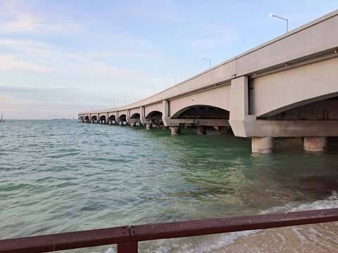 Progreso is a Mexican port city on the Yucatan Peninsula with its iconic arched pier and famous boardwalk
