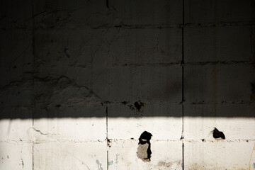 dirty wall concrete old texture cement sunlight crack abstract grunge aged urban vintage look high...