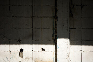 dirty wall concrete old texture cement sunlight crack abstract grunge aged urban vintage look high...