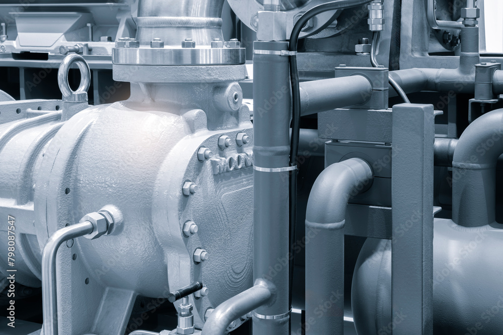Aufkleber a large piece of machinery with many pipes and valves. concept of complexity and technicality
