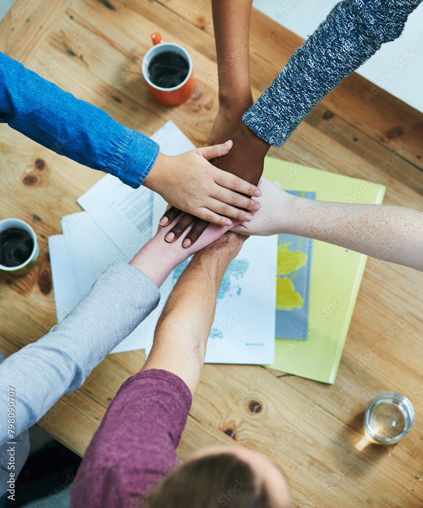 Poster Creative people, hands together and teamwork with diversity, documents or unity for project above at office. Top view of diverse group piling for community agreement, meeting or startup at workplace