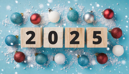 Top above overhead view photo of wooden cubes showing the first day of new year isolated on blue background with snow and baubles - Powered by Adobe