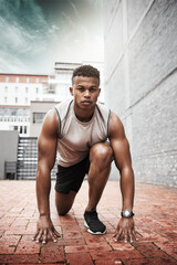 Fitness, portrait and black man ready for race, start workout or running competition in city. Sports, focus and runner athlete in outdoor for sprint exercise, marathon training or speed challenge