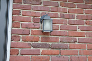 Lamp on a Brick Wall