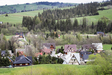 WITOW, POLAND - APRIL 19, 2024: Houses in mountain village Witow, Poland.