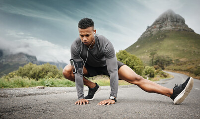 Man, stretching legs and music before exercise, fitness and workout on road outdoor. Male athlete,...