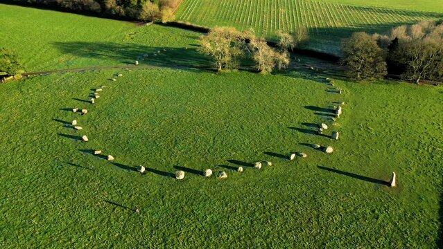 Long Meg and Her Daughters. Prehistoric Neolithic stone circle. Langwathby, Cumbria, UK. Video fly up of circle with Long Meg tall outlier stone right