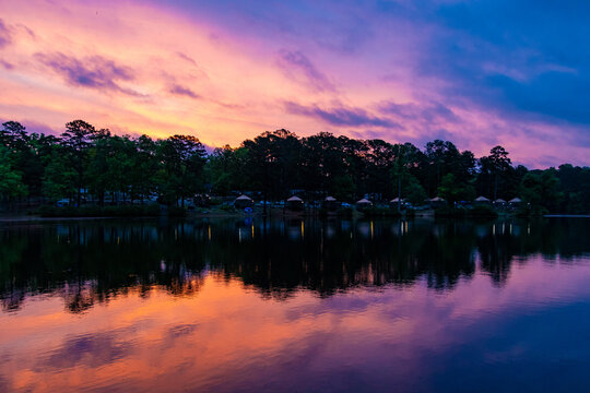 colorful sunrise over lake and RV camp ground in Stone Mountain Park Atlanta