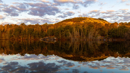 landscape with clouds over mountain and lake during winter in Stone Mountain Park Atlanta