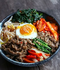 Korean Food, Bibimbap with beef, egg, spinach and kimchi