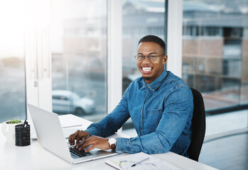 Portrait, smile and black man in modern office with laptop, paperwork and happiness at desk....