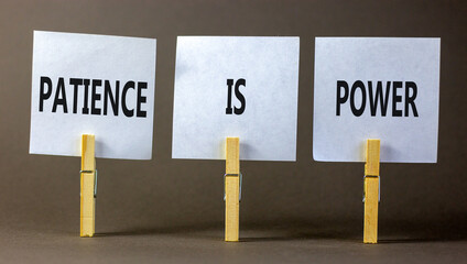 Patience is power symbol. Concept words Patience is power on beautiful white paper on clothespin....