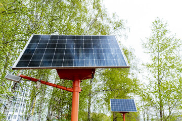 Solar panels on pole in park harnessing sunlight for energy