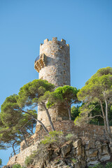 Defense tower Torre dels Perpinyà in Cala de l'Embarcador inside the Cami de Ronda path, Costa...