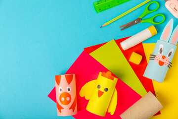 Toilet paper crafts on a colored background. Kids crafts made with toilet paper roll. DIY....