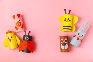 Toilet paper crafts on a colored background. Kids crafts made with toilet paper roll. DIY....