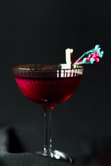 Alcoholic drink. A cocktail with elite alcohol on dark black background