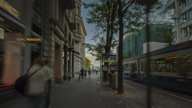 evening time zurich city center tram traffic street pov walking panorama 4k timelapse switzerland  