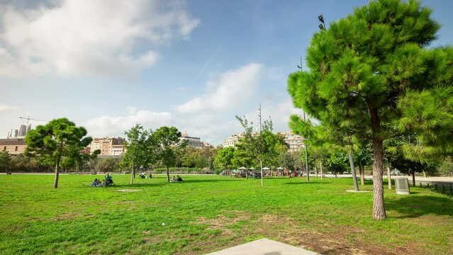 sunny day barcelona city center famous park crowded meadow panorama 4k timelapse spain 