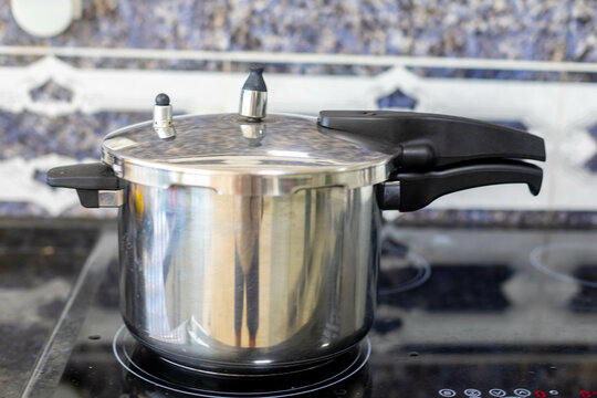 Portrait stainless pressure cooker
