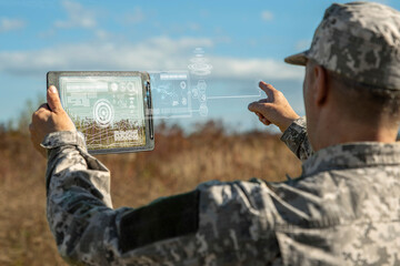 AI technology in the army. Warfare analytic operator checking coordination of the military team....