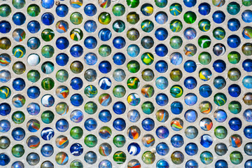 Marbles designed artistic way to create a pattern