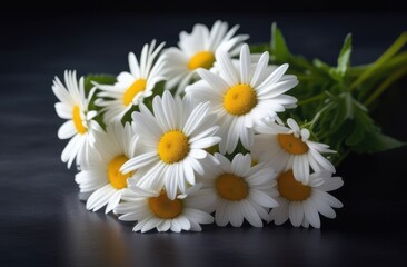 There is a beautiful composition of daisies on the table