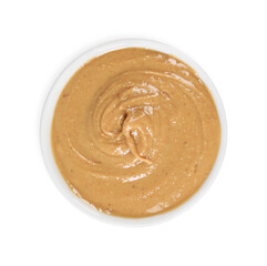 Delicious nut butter in bowl isolated on white, top view