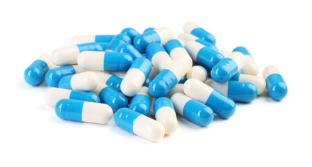 Pile of antibiotic pills isolated on white